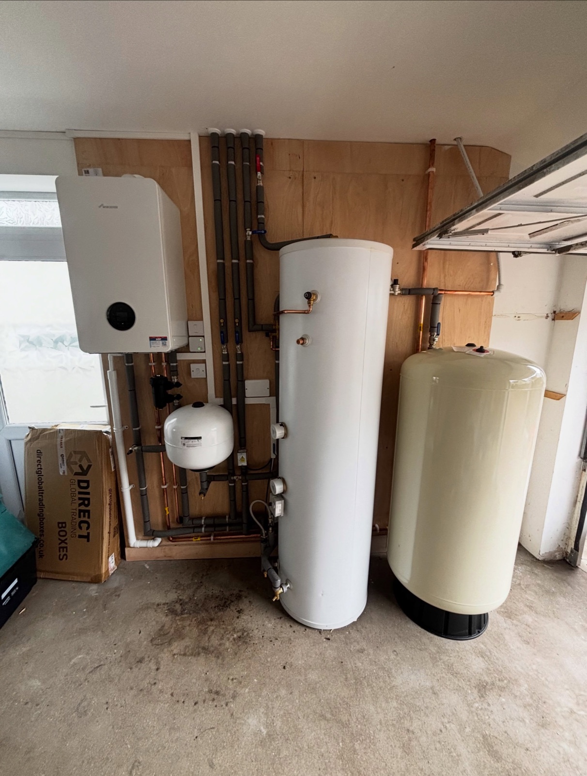 Worcester Bosch boiler and unvented cylinder installed in a garage